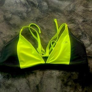 neon green and black champion swim suit top